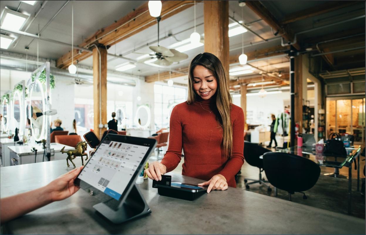 SOLVY Payment Processing - Woman using payment terminal